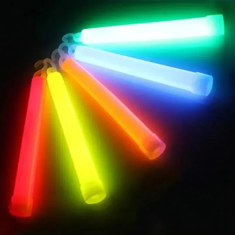 Several glow sticks in different colors, glowing side by side